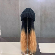 Beanie with removable hair attachment in multi color options.